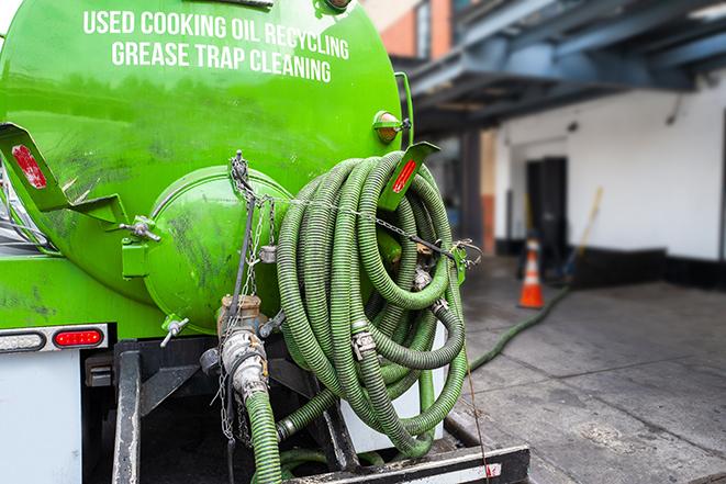 septic tank pump truck in operation in Hawthorne